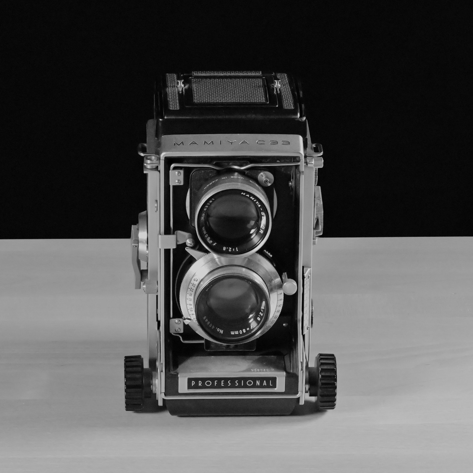 A Mamiya C33 twin lens reflex camera seen from the front