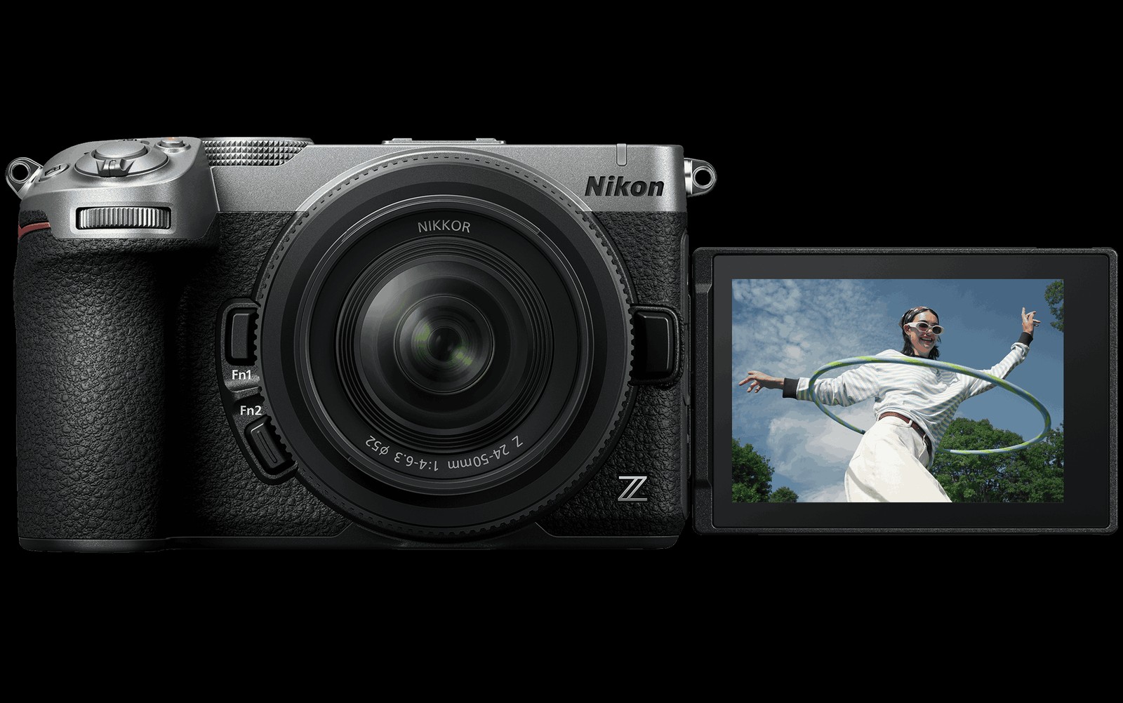 The Nikon Z5IIC seen from the front with its articulating screen swung out to the side