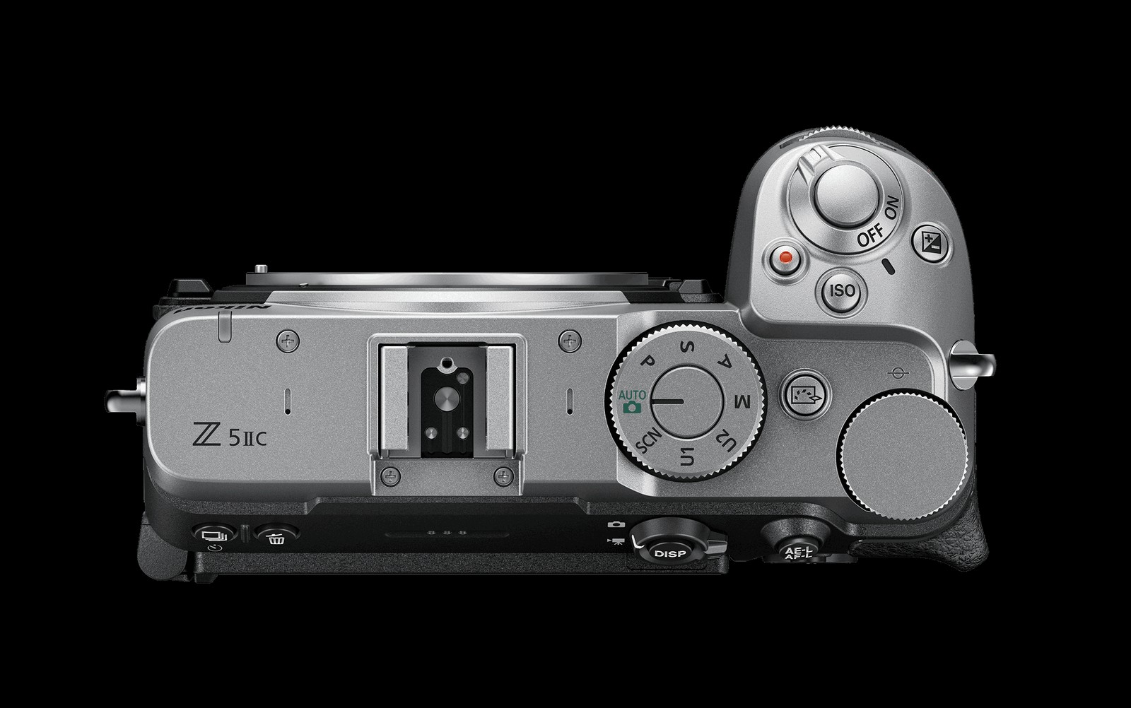 The top of the Nikon Z5IIC showing a flat top plate with no viewfinder hump