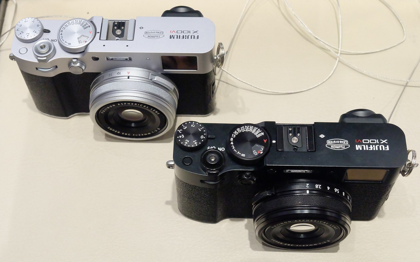 A Fujifilm X100VI compact camera in silver and black